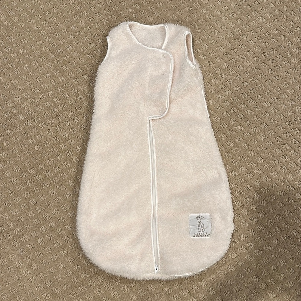 Adorable Little Giraffe sleep sack with satin trim.